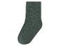 Une chaussette côtelée vert foncé.