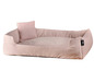 Lit pour chien beige avec coussin.