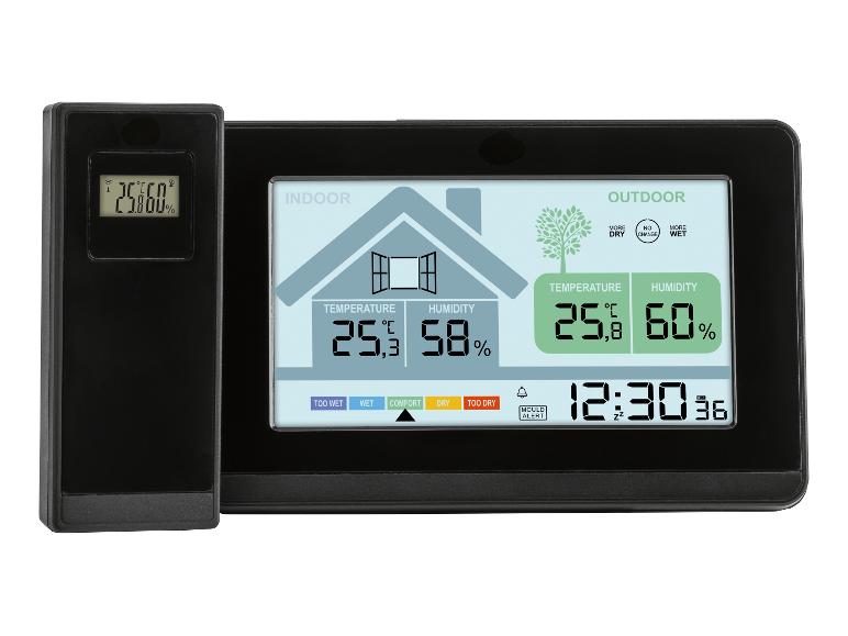 Thermomètre et hygromètre numérique affichant la température et l'humidité intérieure et extérieure.