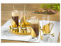 Trois verres à bord doré remplis de café et de crème.