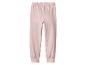 Pantalon de jogging rose pour enfant avec ceinture élastique.