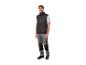 Homme en gilet noir Parkside et pantalon de travail gris