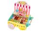 Chariot de magasin de bonbons en bois avec divers bonbons comme du chocolat, des bonbons aux fruits et des sucettes.