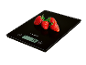 Balance de cuisine numérique avec quatre fraises fraîches, affichant '74g'.
