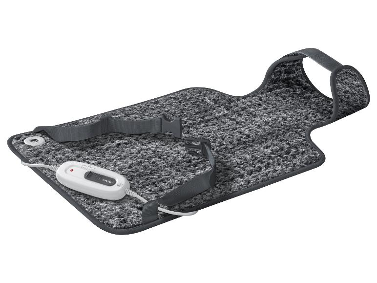 Couverture chauffante Sanitas grise avec télécommande et sangles de fixation.