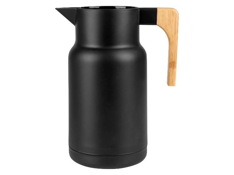 Carafe isotherme noire avec poignée en bambou.