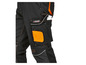 Pantalon de travail noir avec des détails orange et le logo Parkside Performance.