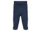 Un pantalon bébé bleu marine avec des pieds.