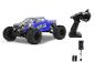 Monster truck télécommandé Whelon, avec sa télécommande et son chargeur.