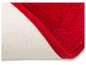 Tapis de bain rouge avec dos antidérapant.