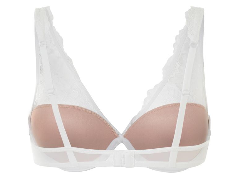 Un soutien-gorge blanc en dentelle avec des bonnets rembourrés.