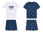 Pyjama garçon : t-shirt blanc « Snooze » et short marine à motifs voiliers.