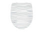 Un abattant de toilette blanc avec un design ondulé.