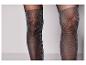 Collants noirs avec des paillettes argentées.