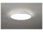 Un luminaire de plafond rond avec une finition blanche.