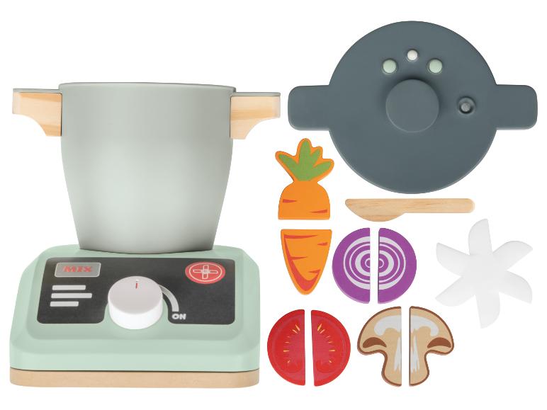 Jeu de cuisine avec une casserole, une poêle et des légumes en bois.