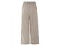 Pantalon large beige à taille élastique.