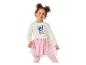 Fille en sweat-shirt crème et jupe en tulle rose avec des fleurs scintillantes.