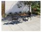 Ensemble table et chaises de jardin en résine tressée : mobilier d'extérieur.