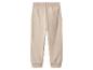 Pantalon de jogging beige pour enfant avec taille et poignets côtelés.