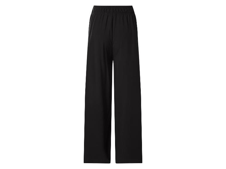 Pantalon noir large avec taille élastiquée.