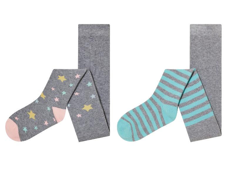 Deux paires de collants gris, l'un avec des étoiles et l'autre avec des rayures.