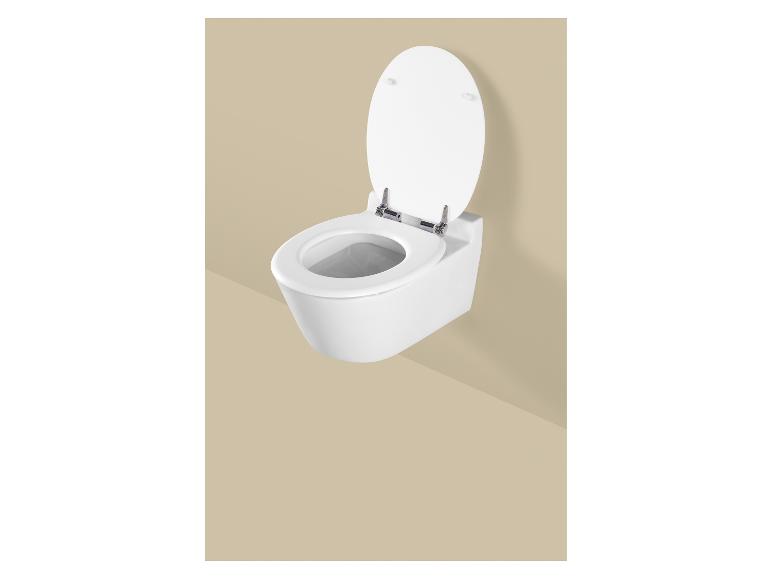 Toilettes murales blanches avec abattant ouvert sur un mur beige.