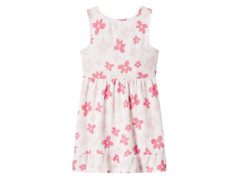 Robe blanche sans manches pour fille avec imprimé floral rose.