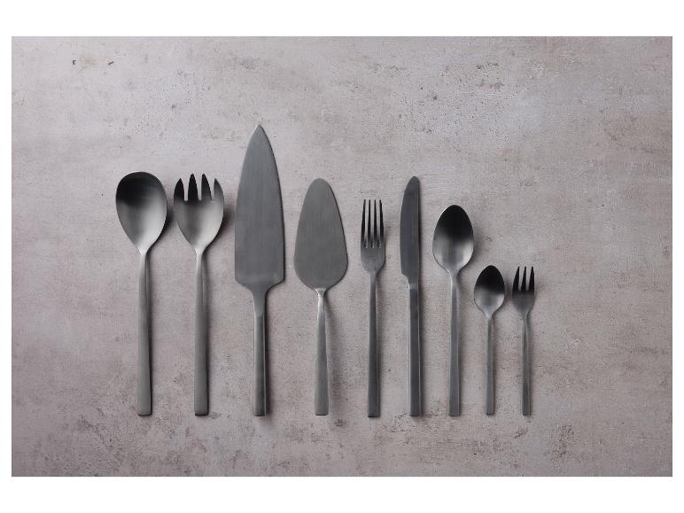 Couverts noirs mats : spatules, cuillères, fourchettes.
