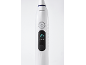 Brosse à dents électrique blanche avec écran affichant le mode massage et le bouton d'alimentation