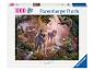 Un puzzle Ravensburger de 1000 pièces avec des loups dans une forêt.