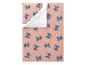 Housse de couette et taie d'oreiller avec motif de personnages bleus sur fond rose à pois.