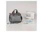 Sac de couture gris avec fils et machine à coudre SilverCrest sur fond clair.