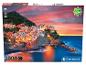 Un puzzle de 1000 pièces de Clementoni avec un coucher de soleil sur Manarola.
