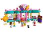 Ensemble LEGO Friends avec magasin de bonbons, figurines et accessoires.