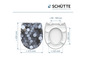 Abattant de WC avec un motif de cercles abstrait et un abattant de WC blanc simple.