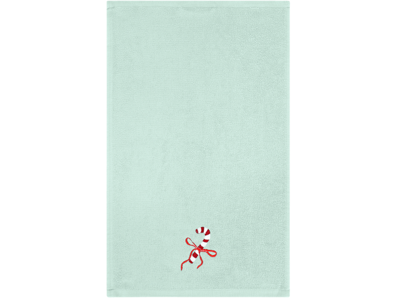 Serviette menthe avec broderie de canne à sucre et nœud rouge.