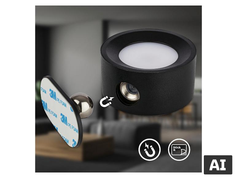 Lumière LED magnétique noire avec diffuseur blanc, montrée avec sa base magnétique adhésive.