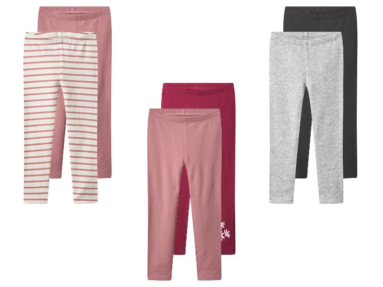 Trois ensembles de leggings pour enfants : rose rayé, rose/bordeaux uni et gris/noir.