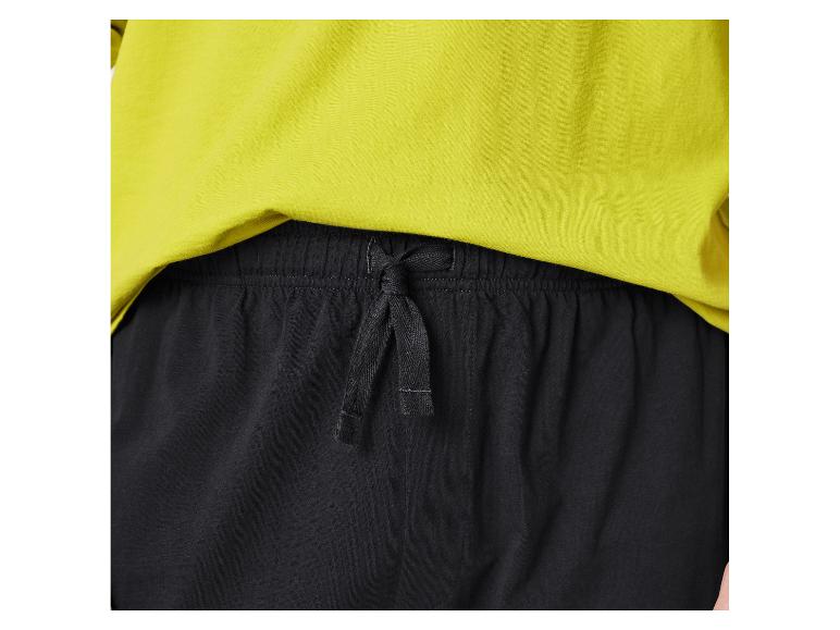 T-shirt jaune fluo et short noir avec cordon de serrage
