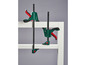 Deux serre-joints Festool verts sur une surface blanche.