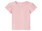 T-shirt rose à manches courtes froncées.