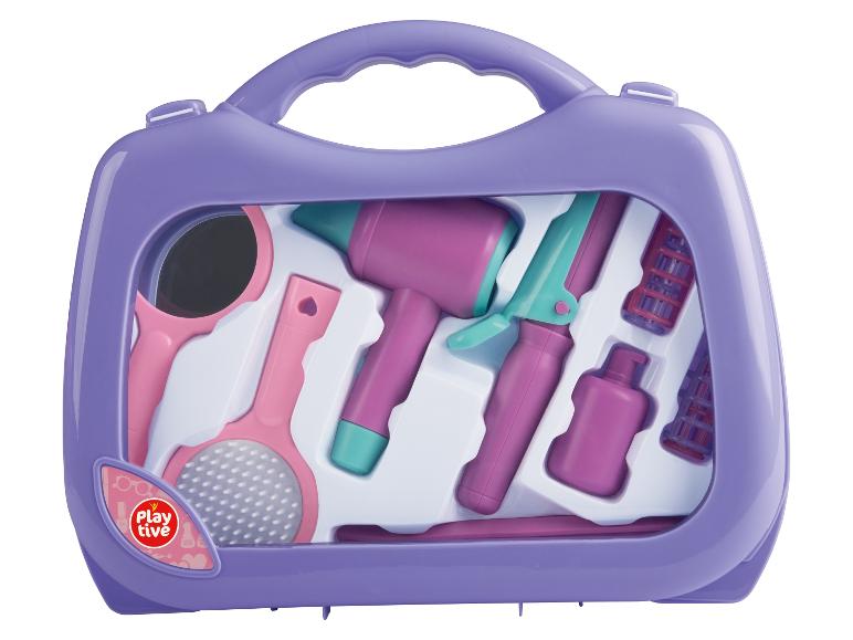 Ensemble de coiffure Playtive avec sèche-cheveux, brosse et peignes.
