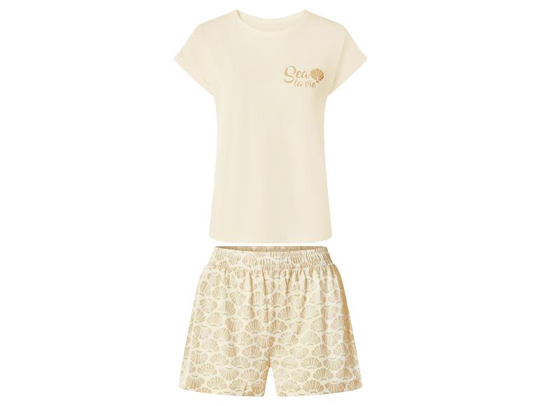 Ensemble de pyjama crème avec texte 'Sea la vie' et short imprimé coquillages.