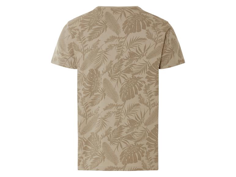 T-shirt beige homme avec imprimé feuilles tropicales.