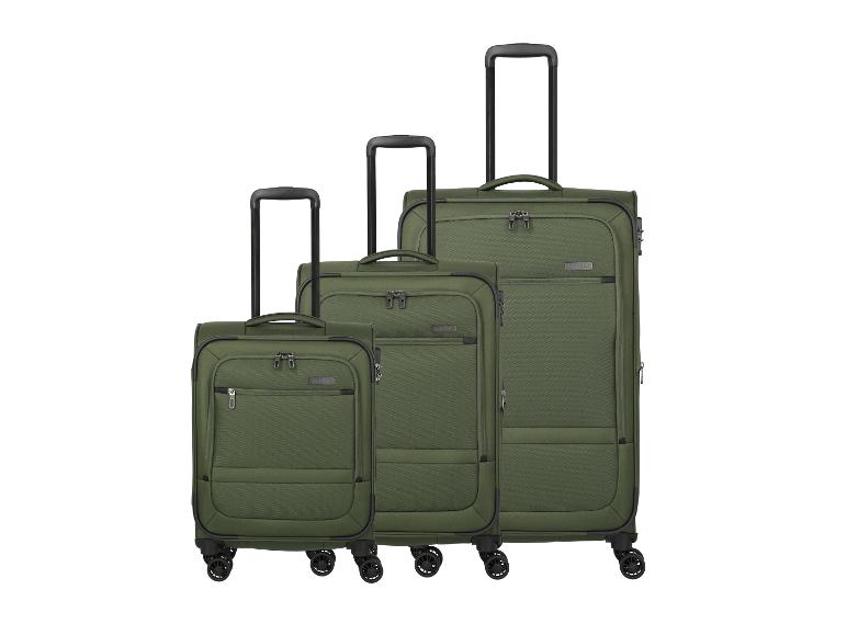 Ensemble de trois valises en tissu vert à roulettes avec poignées télescopiques.