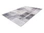 Tapis rectangulaire avec motif géométrique abstrait dans des tons gris et blancs