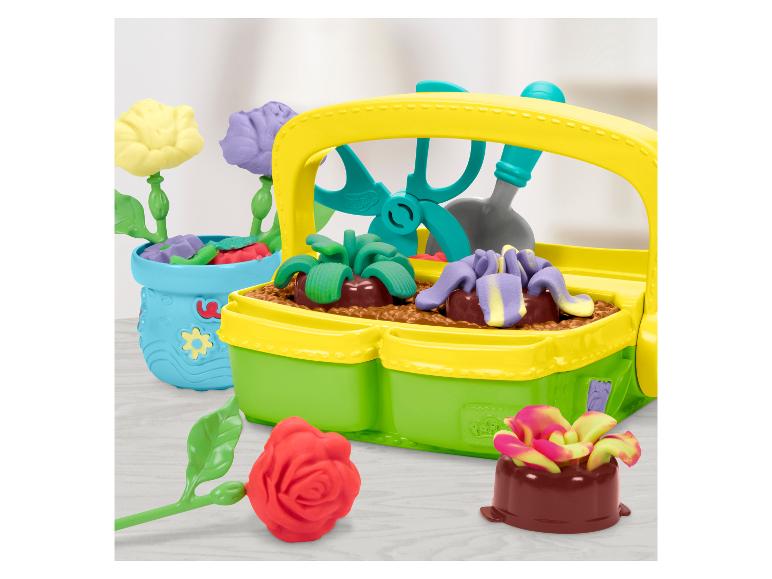 Kit de jardinage Play-Doh avec des fleurs et des plantes colorées en pâte à modeler