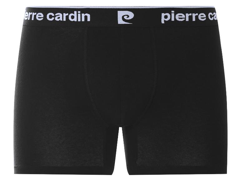 Caleçon boxer noir pour homme avec ceinture élastique blanche avec texte et logo.