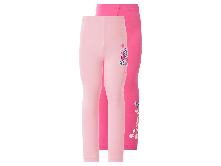 Deux leggings pour enfants roses et fuchsia avec imprimé dessin animé.